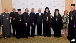 Отец Александр Карлуцос (пятый слева)