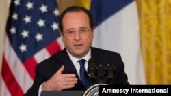 法国总统奥朗德2月11日在记者会上