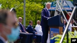 Джо Байден выступает на выпускной церемонии в Академии береговой охраны США в Нью-Лондоне, штат Коннектикут, среда, 19 мая 2021 г. 