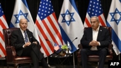 Президент США Джо Байден (слева) и премьер-министр Израиля Биньямин Нетаньяху в Тель-Авиве 18 октября 2023 года