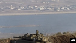 Израильский танк на израильско-сирийской границе