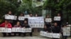 江西新余市公民举牌声援被拘北京活动人士