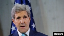 美国国务卿克里2014年10月在访问德国时在记者招待会上讲话。（资料照片）