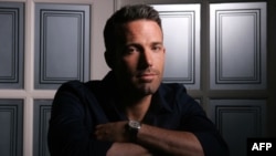 January 19: U.S. President Barack Obama (L) shakes hands with Chinese President Hu Jintao after a joint news conference in the East Room at the White House. (Reuters/Jim Young)
